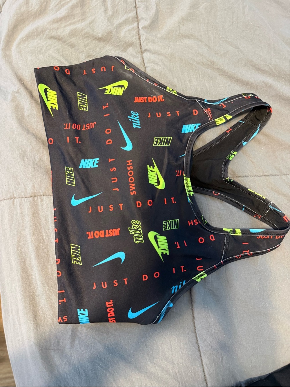Nike Black Sports Bra with Neon Blue, Lime Green & Bright Red Logos
